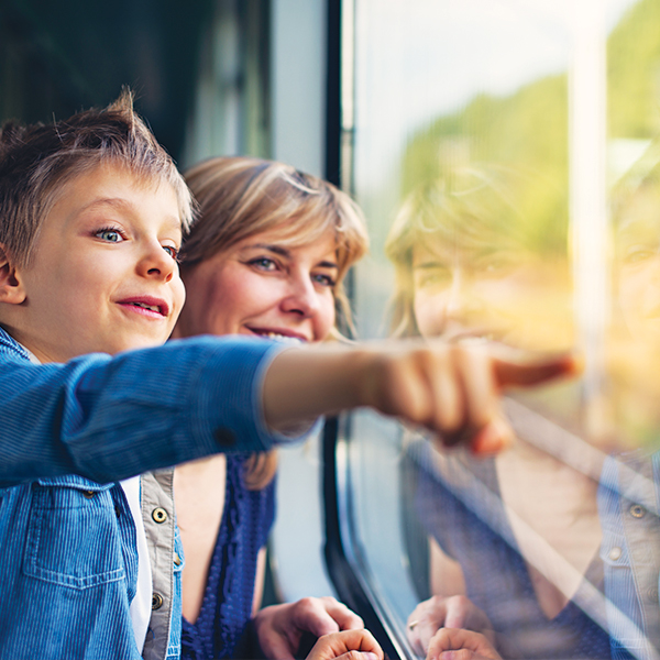 mom and son on train