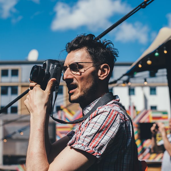 man taking a photo