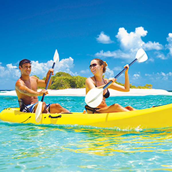 Couple Kayaking on Vacation