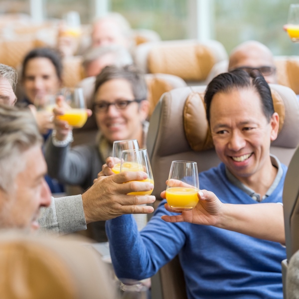 a toast onboard Rocky Mountaineer luxury train car