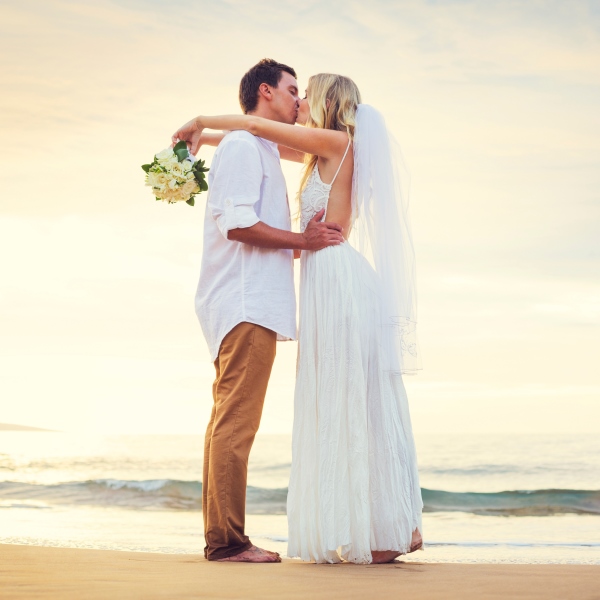 bride and groom on the beach
