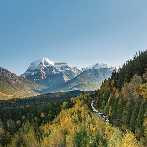train riding through the Canadian Rockies