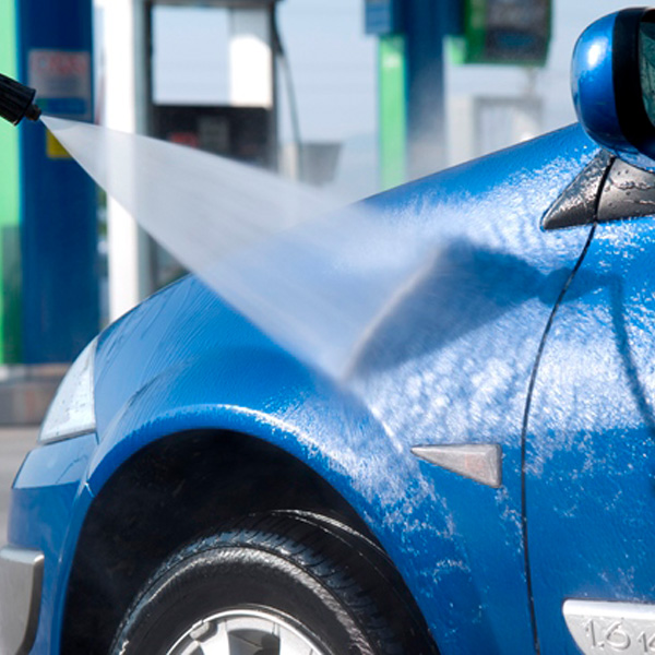 A vehicle getting a car wash 