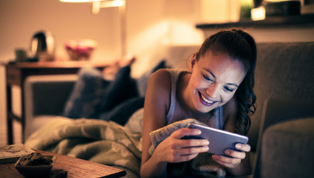 woman on cell phone smiling