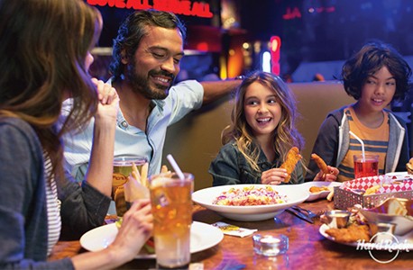People eating at the Hard Rock Cafe