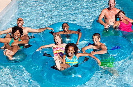 AAA members floating in innertubes